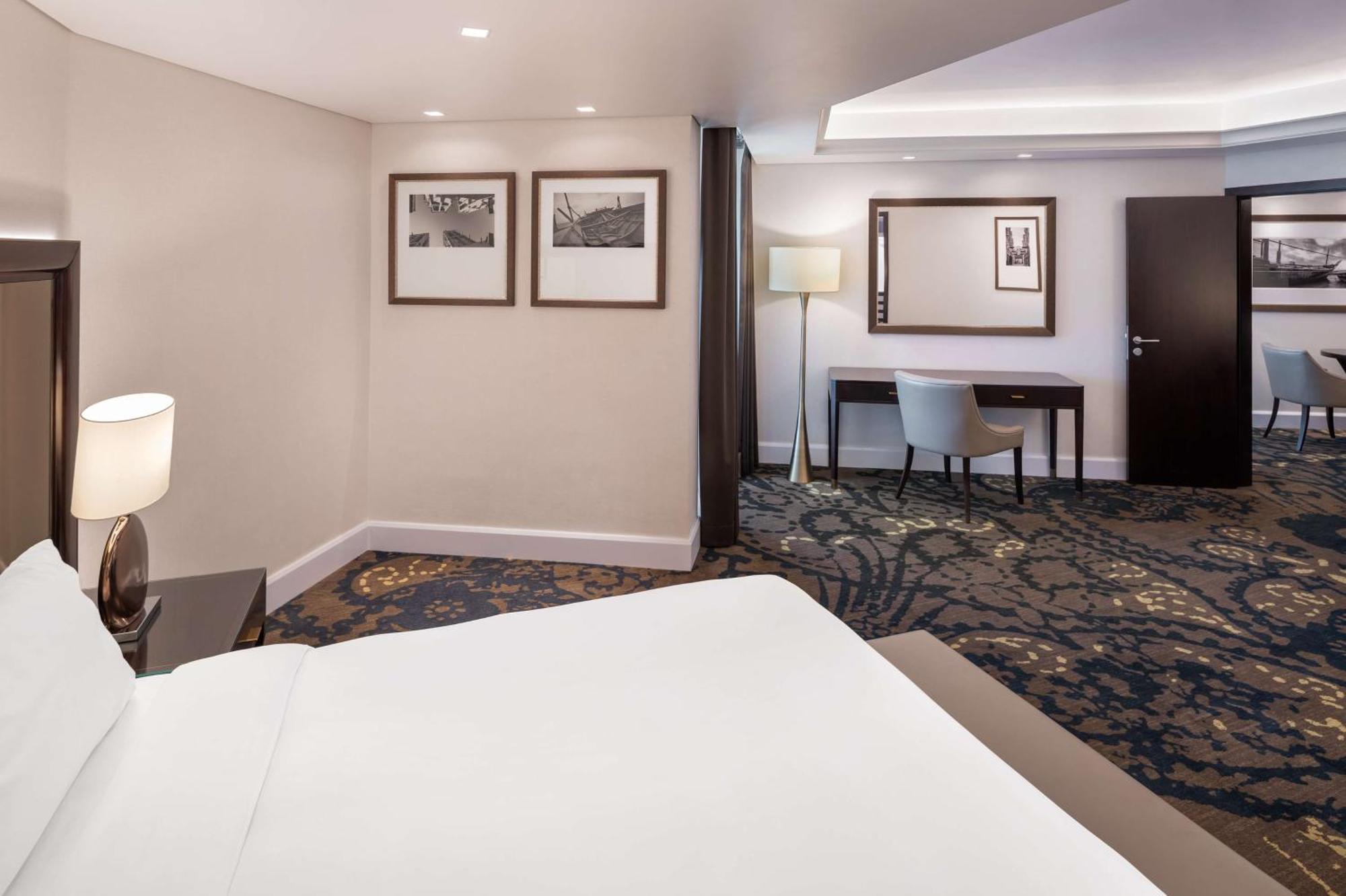 Suite with Lounge Access and Balcony - Creek View
