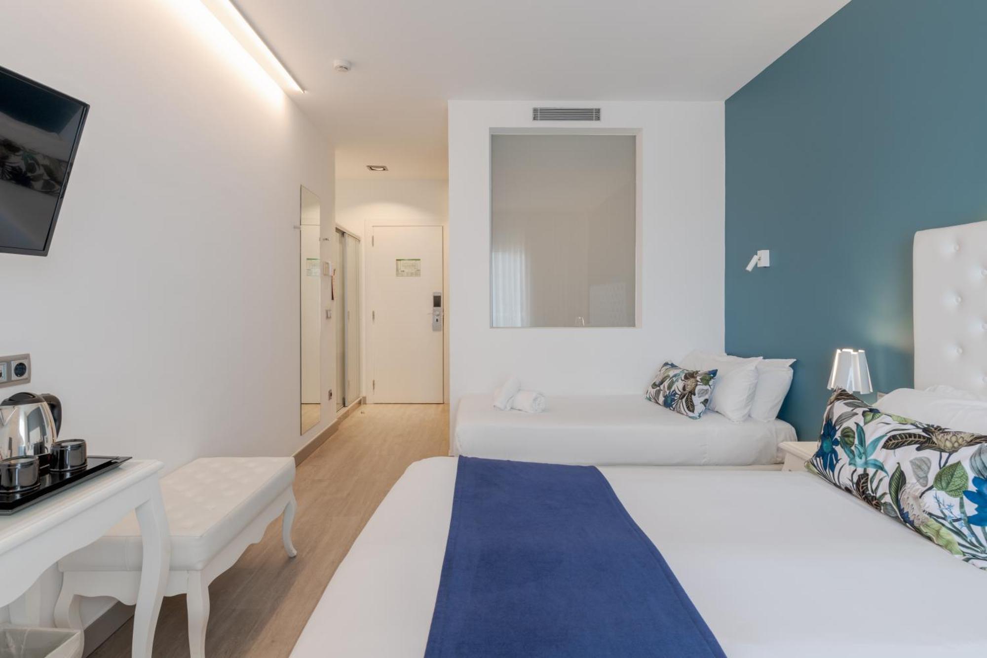 Habitación Tripe Confort con balcón