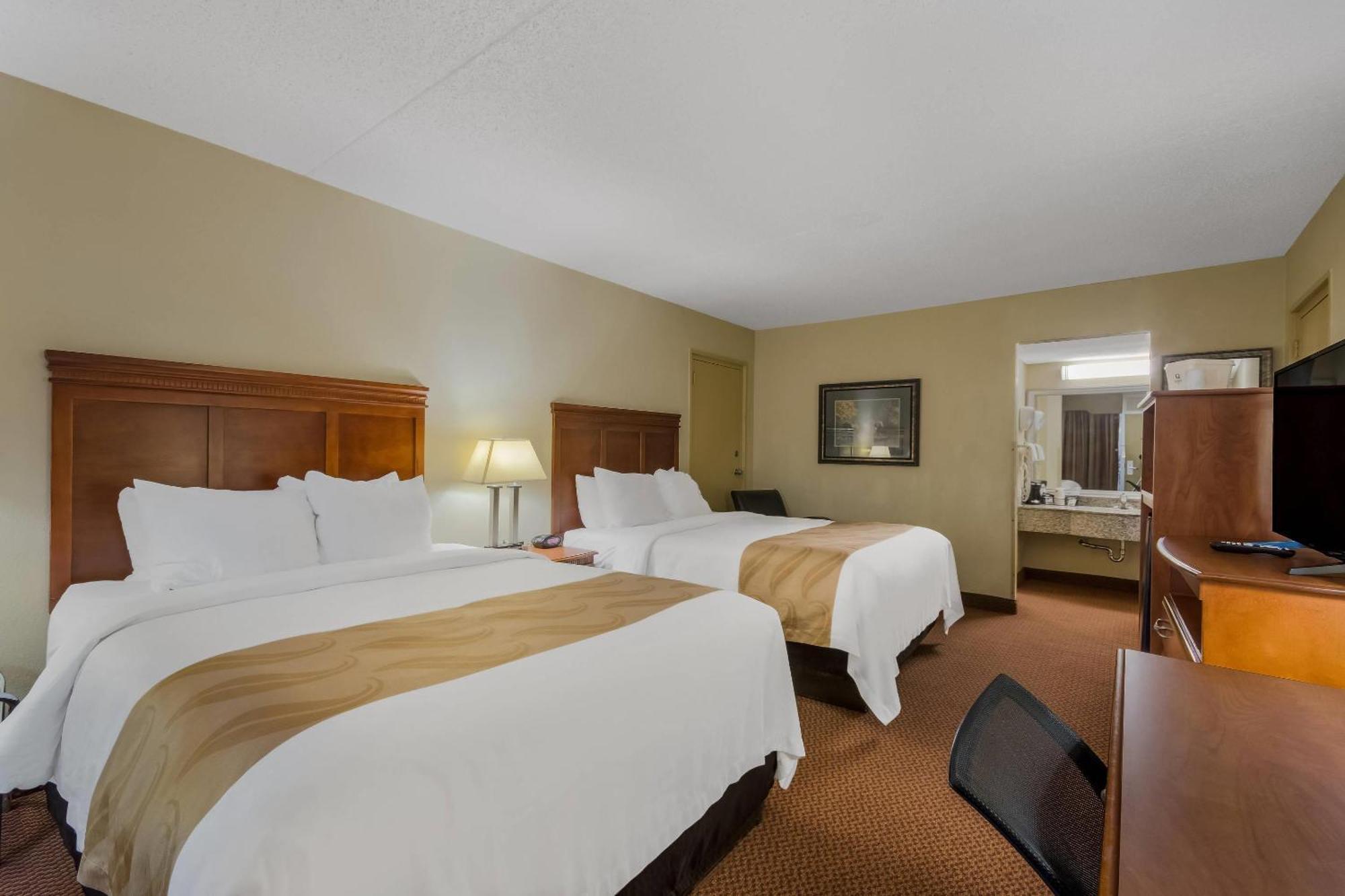 Quadruple Room Two Queen Beds Poolside Non Smoking