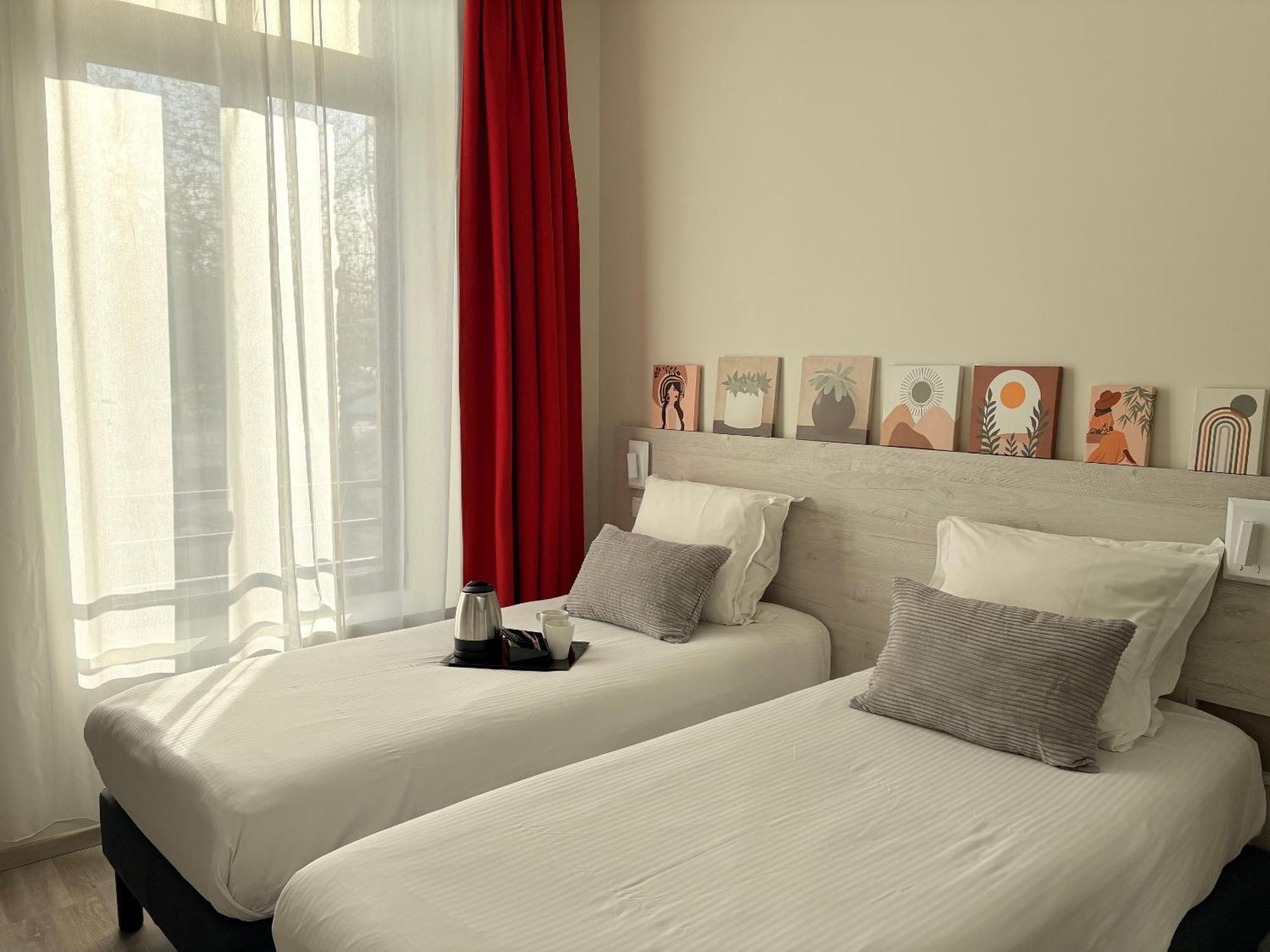 Quarto com 2 Camas de Solteiro
