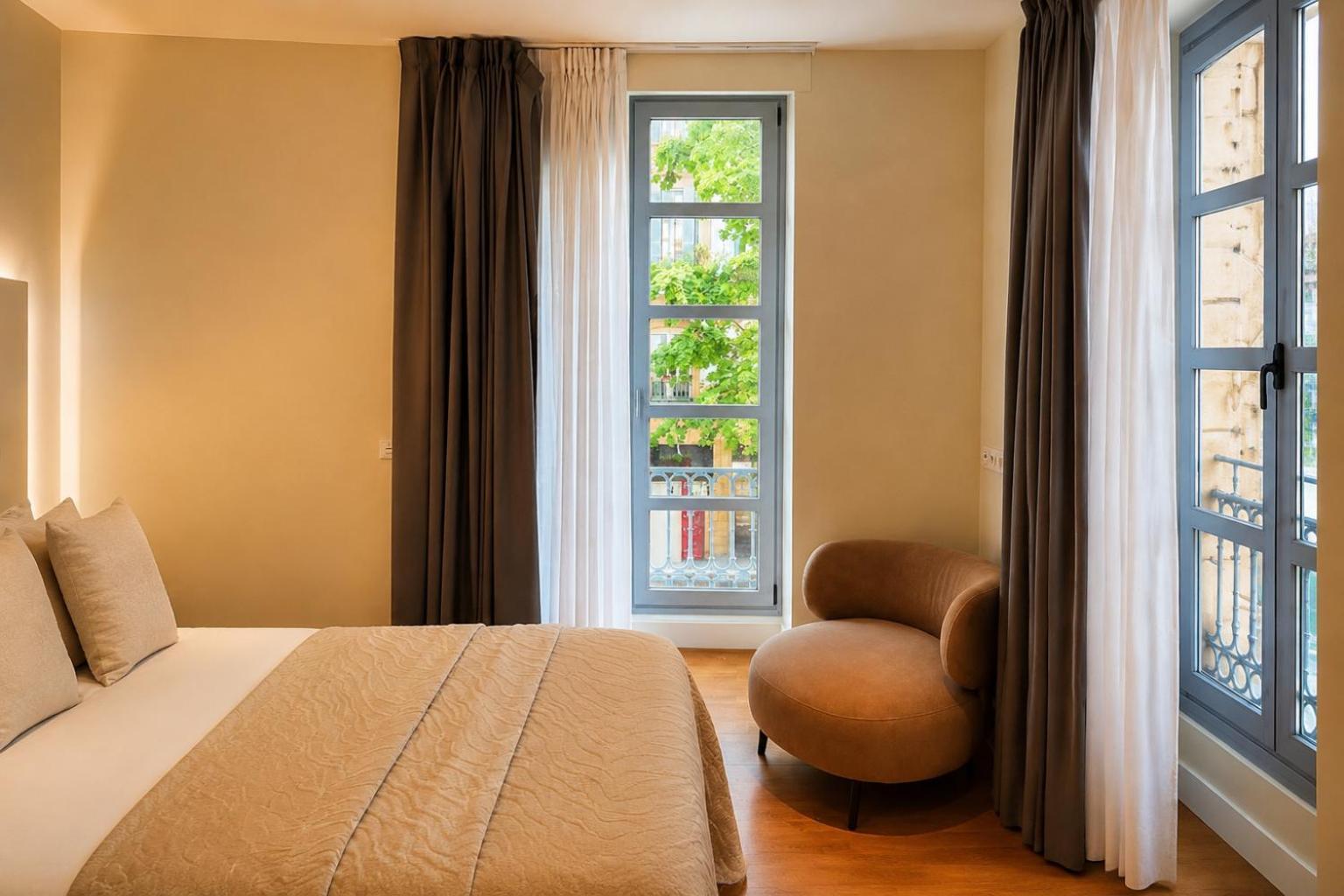 Kamer met 1 Groot Bed of 2 Aparte Bedden en Uitzicht op de Stad