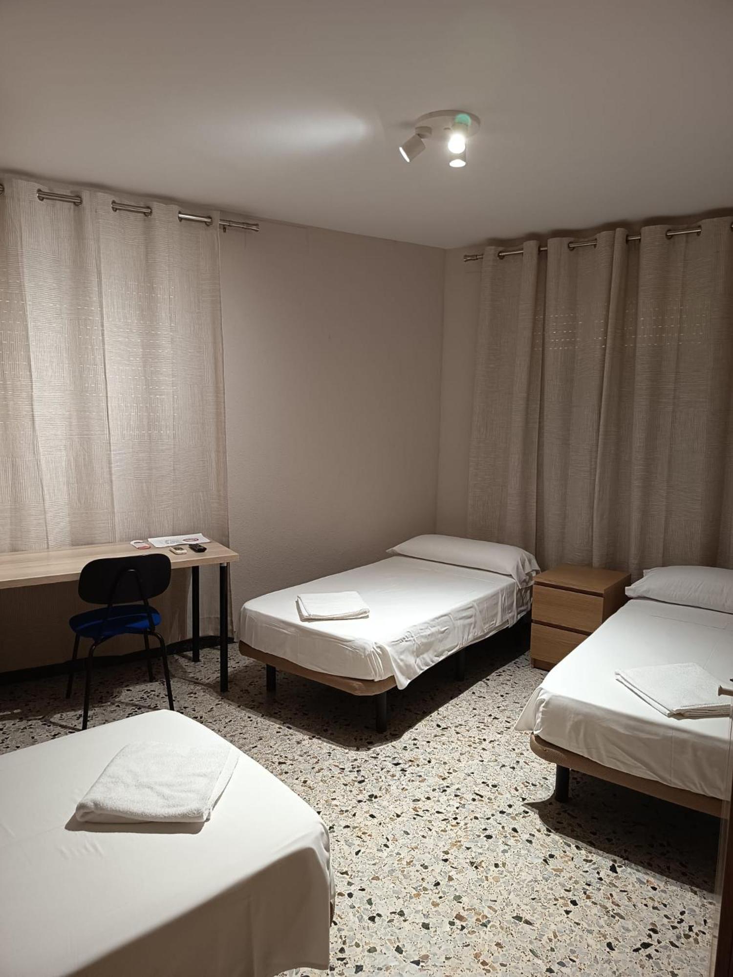 Habitación Triple Confort con ducha