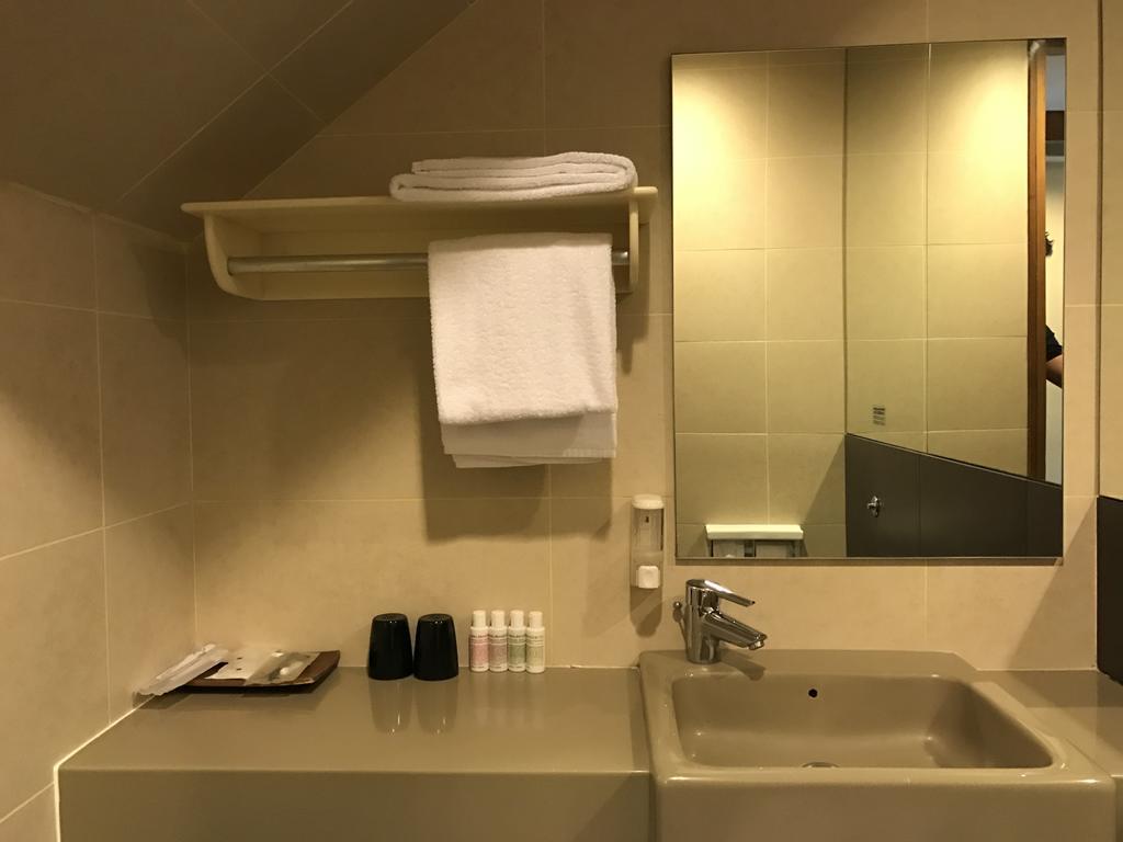 Suite met Queensize Bed en Daktuin